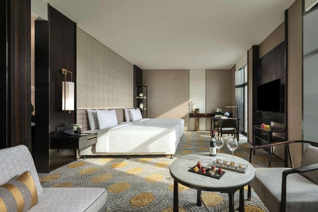 Beijing Hotel Quarto foto